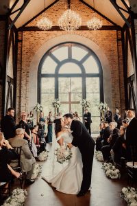 Iron Manor Wedding Ceremony with beautiful arched windows